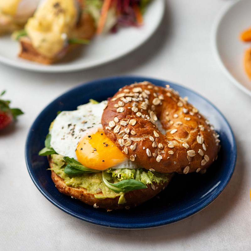 Bagel with avocado and egg