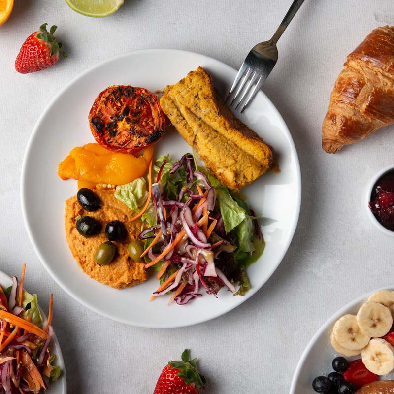 Plate with hummus and vegetables